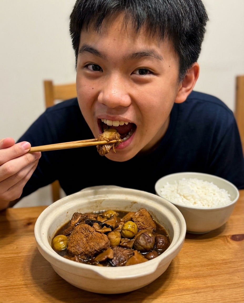 Teen boy eating